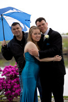 High school prom couple posing at Brewer Riverwalk