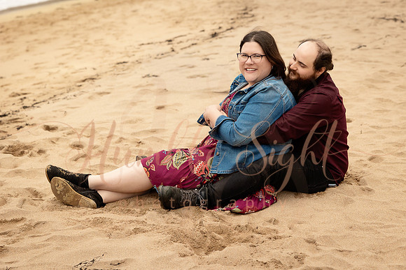 Couple portraits with Acadia coastal scenery in Maine