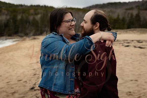 Couple portraits with Acadia coastal scenery in Maine