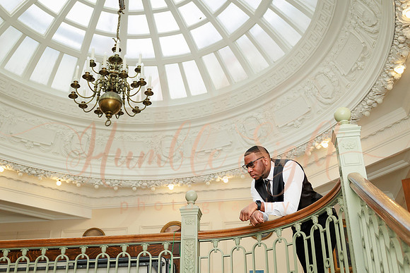 Bride and groom on the steps of Bangor City Hall