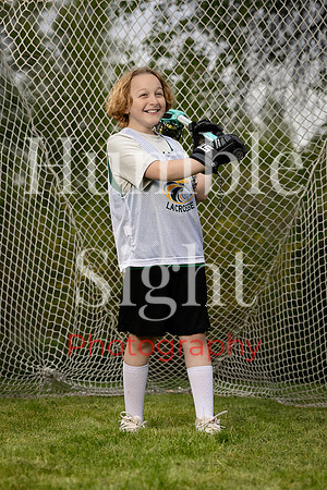 Dynamic sports portrait with lacrosse gear