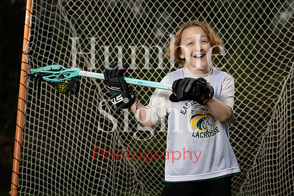 Lacrosse sportrait session for Eastern Maine athlete
