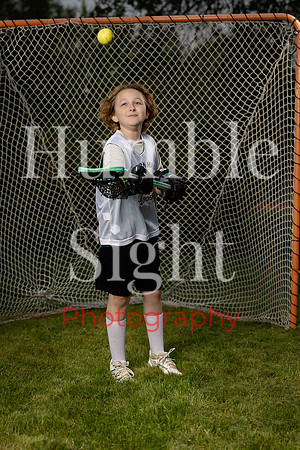 Dynamic sports portrait with lacrosse gear