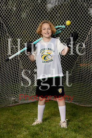 Lacrosse sportrait session for Eastern Maine athlete