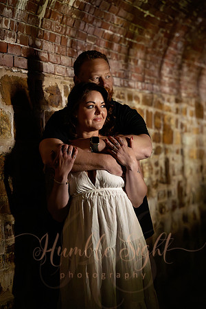 Adventurous engagement photos at Maine stone fortress