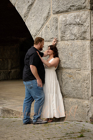 Adventurous engagement photos at Maine stone fortress