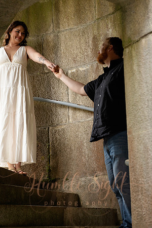 Adventurous engagement photos at Maine stone fortress