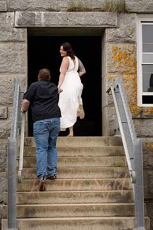 Adventurous engagement photos at Maine stone fortress