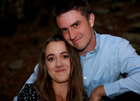Golden hour engagement portraits in open field in Maine