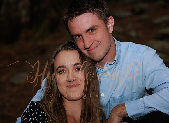 Golden hour engagement portraits in open field in Maine