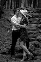 Couple embracing at sunset during Maine engagement shoot