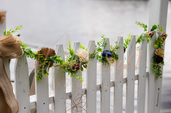 King Hewes wedding on dock at Cold Stream Pond in Enfield Maine