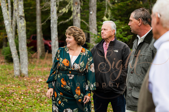 King Hewes wedding on dock at Cold Stream Pond in Enfield Maine