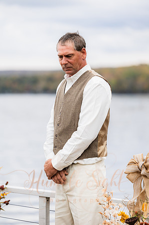 King Hewes wedding on dock at Cold Stream Pond in Enfield Maine