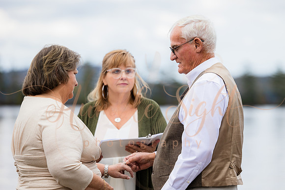 King Hewes wedding on dock at Cold Stream Pond in Enfield Maine