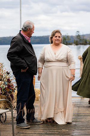 King Hewes wedding on dock at Cold Stream Pond in Enfield Maine