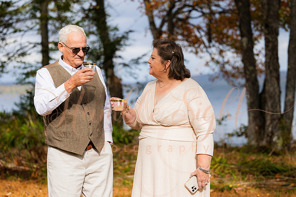 King Hewes wedding on dock at Cold Stream Pond in Enfield Maine