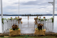 King Hewes wedding on dock at Cold Stream Pond in Enfield Maine