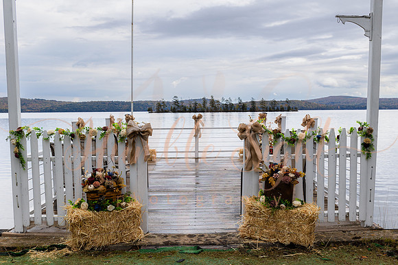 King Hewes wedding on dock at Cold Stream Pond in Enfield Maine