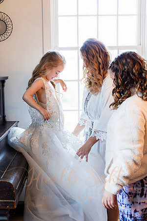 Blended family wedding ceremony with daughters in Maine