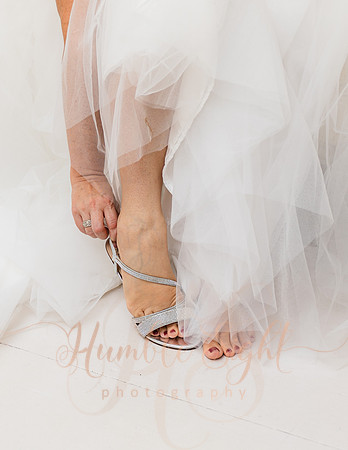 Bride and groom laughing during Maine wedding reception
