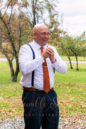 Bride and groom laughing during Maine wedding reception
