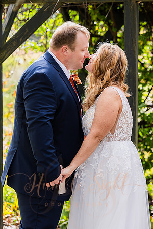Bride and groom laughing during Maine wedding reception