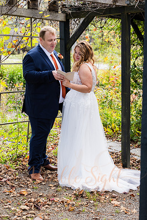 Bride and groom laughing during Maine wedding reception