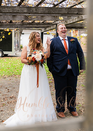 Bride and groom laughing during Maine wedding reception