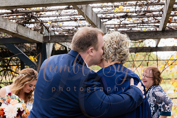 Blended family wedding ceremony with daughters in Maine