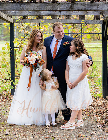 Blended family wedding ceremony with daughters in Maine