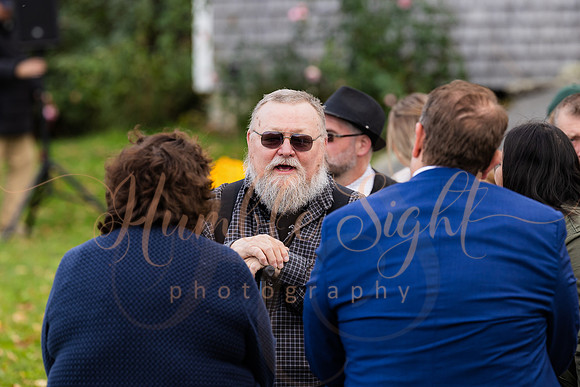 Bride and groom laughing during Maine wedding reception