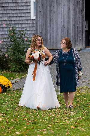 Bride and groom laughing during Maine wedding reception