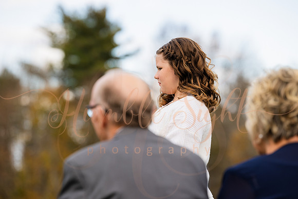 Bride and groom laughing during Maine wedding reception