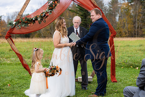 Blended family wedding ceremony with daughters in Maine