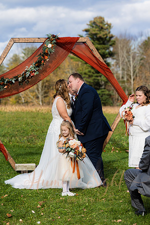 Bride and groom laughing during Maine wedding reception