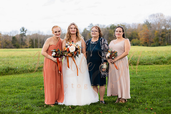 Blended family wedding ceremony with daughters in Maine
