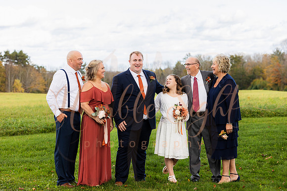 Packed dance floor at Maine farmhouse wedding reception
