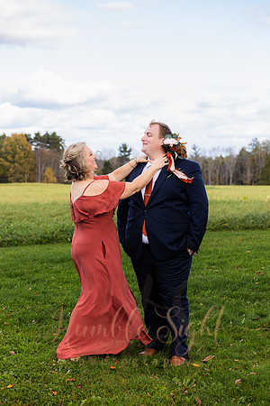 Bride and groom laughing during Maine wedding reception