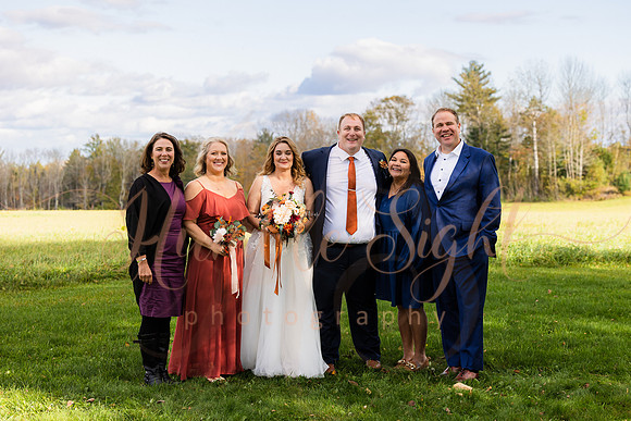 Packed dance floor at Maine farmhouse wedding reception