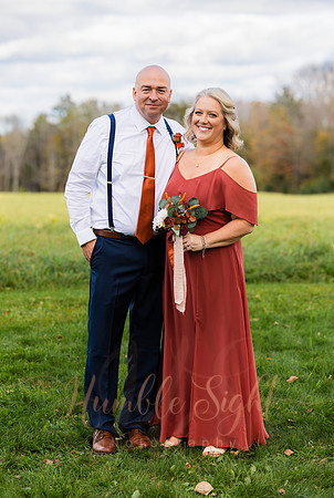 Bride and groom laughing during Maine wedding reception