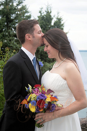 Bride and groom portraits overlooking Bar Harbor coastline