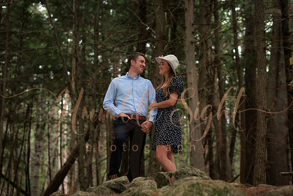 Golden hour engagement portraits in open field in Maine