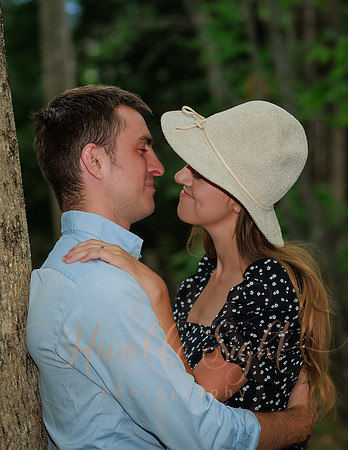 Joyful engagement session in wooded Maine setting