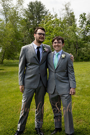 Bride and groom portraits by the water at Grace on the Lake