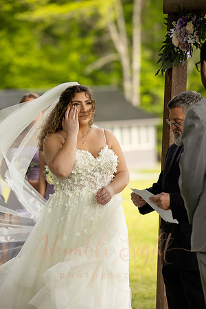 Bride and groom portraits by the water at Grace on the Lake