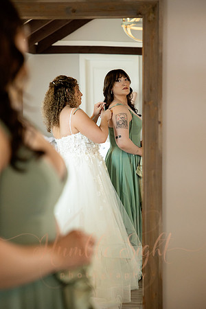 Bride and groom portraits by the water at Grace on the Lake