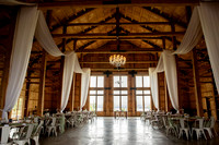 Bride and groom portraits by the water at Grace on the Lake