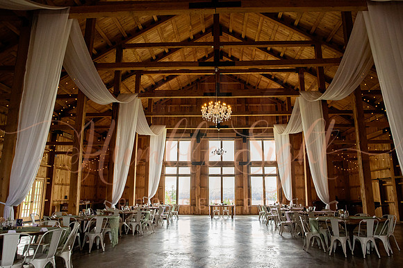 Bride and groom portraits by the water at Grace on the Lake