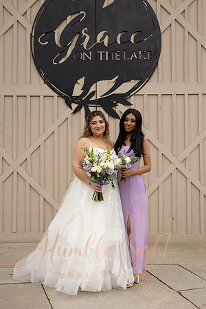 Bride and groom portraits by the water at Grace on the Lake